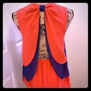 Women’s hi lo sheer front cut out back.